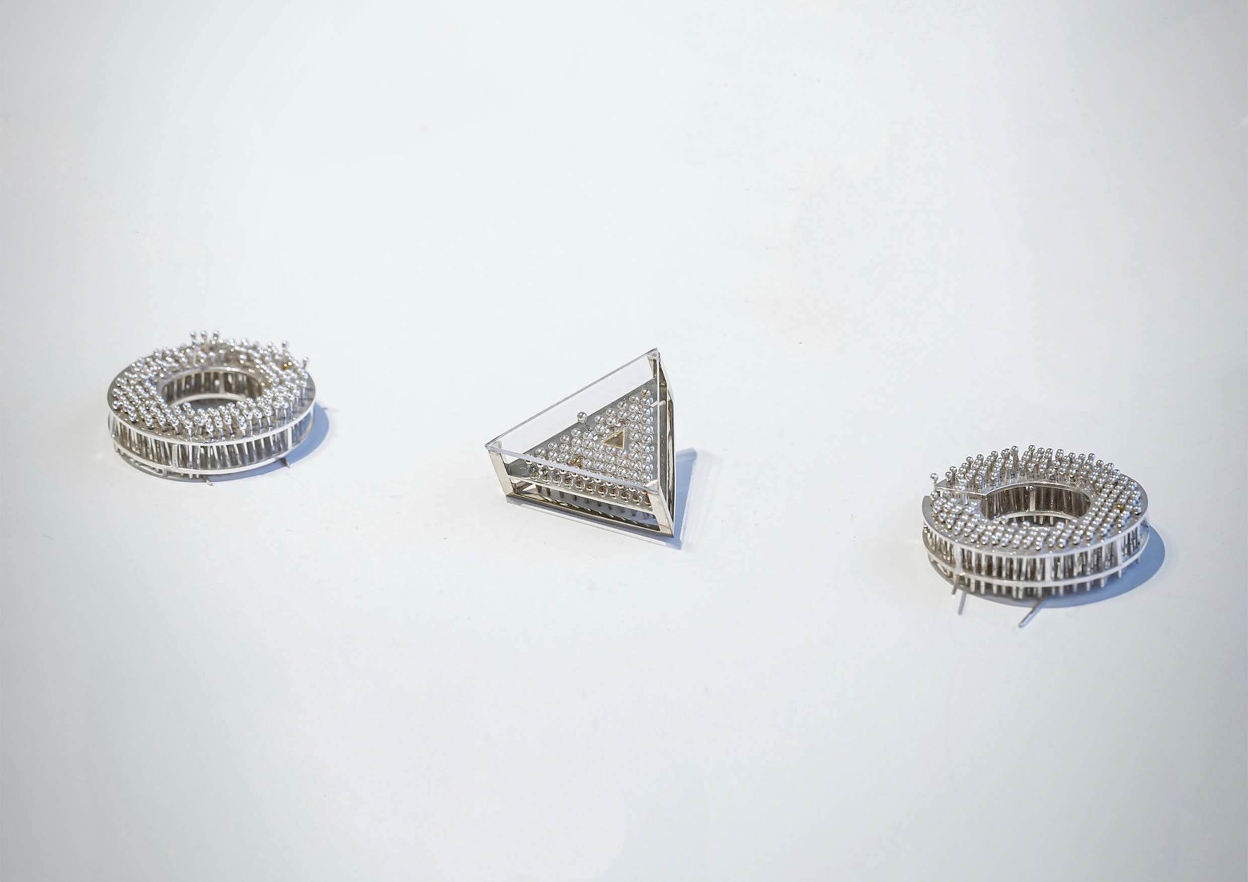 "Less Than One" Brooch Series